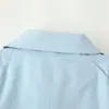 Nueva colección de otoño de ropa para mujer estilo europeo y americano: gabardinas de moda, elegantes y chic con cuello alto, detalles de botones y un cinturón decorativo
