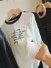 Nueva Camiseta Elegante de Manga Larga con Estampado de Letras para Mujer Otoño 2026, Cuello Redondo, Ligeramente Transparente, Corte Holgado, Top Fino Versátil Casual, Moderno