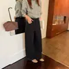 Calça casual de corte tridimensional de cintura média a alta, tendência 2026, estilo workwear, perna larga para mulheres no outono, com caimento solto e fluido.