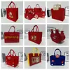 2026 Nuevo Bolso de Fieltro Rojo Festivo Bolso de Mano de Recuerdo Bolso Tote de Regalo Bolsa de Almacenamiento Fabricante