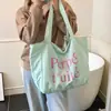 Bolsa de Tote Casual de Nylon Estilo Coreano Moda Ins Estampado de Letras Bolso de Mano Bolso de Hombro Rayado de Doble Cara Celebridad de Internet para Mujer