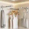 Tendedero retráctil transfronterizo, tendedero de pared de acero inoxidable, estante de almacenamiento, estante de almacenamiento para uso doméstico sin perforación