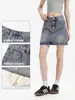 Minifalda de mezclilla simple estilo preppy para mujer, de cintura alta, que se ajusta a la cadera, retro, desgastada y anti-exposición