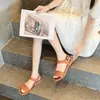 Sandalias y pantuflas para mujer, verano, nuevo estilo romano, planas para exterior, antideslizantes, para vacaciones, playa, hebilla, moda, combinan con todo
