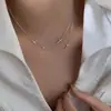 Collar con colgante de cruz para mujer, diseño de nicho, lujo ligero, alta gama, moda japonesa y coreana, cadena para la clavícula para novia