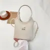 Bolso de Mano Versátil de Color Sólido para Mujer, Estilo Nuevo con un Toque de Lujo, Moderno, Sencillo, Casual, Bolso de Hombro para el Trabajo, Transfronterizo