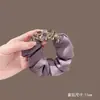 Goma para el pelo de satén con cristal morado 2026 Nuevo estilo Scrunchie con un toque de alta gama, Elegante accesorio para el pelo para mujer