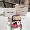Una generación de bolsos de sillín de diseño pequeño con contraste de color para graffiti, bolso de hombro/axila de alto diseño 2024 venta al por mayor