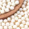 Botones naturales de concha al por mayor en stock para trajes, camisas, cárdigans, botones decorativos de color sólido simples y de alta gama, botones accesorios para ropa