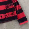 Al por mayor transfronterizo europeo y americano Camiseta de manga larga de otoño Patrón de bloques de color a rayas rojas y negras Estilo callejero Patrón estampado Top para hombre