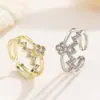Anel de diamante super brilhante em formato de onda de batimento cardíaco! Design aberto em camada dupla com um toque de luxo leve e nicho, disponível em dourado e prata, estilo versátil