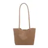Bolsa de mano tipo tote retro estilo coreano al por mayor para mujer 2026 Verano Nuevo Color Sólido Tejida Bolso de Hombro Único Bolso de Hombro para Viaje