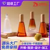 Suministro Directo Transfronterizo Tapa de Madera de Bambú Botella Cónica de Vidrio para Cuidado de la Piel Botella de Aceite Esencial 15ml Botella con Ruedita Marrón a Prueba de Luz Botella para Esencia