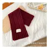 Versión coreana de bufanda de lana para niños con flor, bufanda popular de otoño e invierno, tejida, color liso, trenzado, bufanda de moda versátil