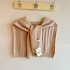 2025 Nuevo Chal Pequeño de Punto Hueco Color Sólido Coreano para Mujer Nudo Exterior Lavadora Moda Primavera y Verano Lavadora Cálida