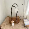 Nuevo bolso tipo bowling de lunares otoño/invierno 2026, bolso tote elegante y moderno, bolso de hombro y bolso de axila para el trabajo y los desplazamientos