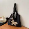 Bolso casual de tela de gran capacidad para mujer, nuevo diseño de moda de verano 2026, bolso de hombro simple, bolsa tote para uso diario