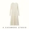 Nuevo vestido de punto de suéter de cachemira para mujer de otoño e invierno, corte ajustado, suave, grueso, cuello redondo, vestido hasta la rodilla