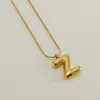 Venta Caliente Transfronteriza 26 Collares en Inglés A-Z Letra Gruesa Cadena de Serpiente Redonda Chapado en Cobre Oro de 18K Colgante de Letra Burbuja para Mujer
