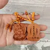 Chaveiro de imitação de madeira de pêssego pingente de bolsa de madeira esculpida barraca pequena mercadoria chave de carro pendurado atacado uma geração de cabelo