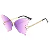 Gafas de sol mariposa medio metal sin montura color caramelo degradado pieza oceánica moda retro tendencia europea y americana gafas de sol al por mayor