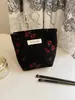 Bolsa de Maquillaje Nueva de Nicho de Gran Capacidad con Interior Floral Tejido, Bolso Conveniente para Uso Diario, Bolso de Mano para Mujer, Estilo Ins