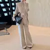 Fábrica de Malhas Dalan Source: Conjunto de duas peças moderno e elegante para o início do outono, novo estilo, malha de manga morcego soltinha e calça, que emagrece
