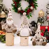 Colgante de figura de dibujos animados de Santa y muñeco de nieve de Navidad transfronterizo, muñeco sentado, decoración de ventana y hogar de Navidad