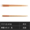 Venta al por mayor de fábrica Palillos de madera de ala de pollo de haya Sándalo rojo Madera de loto Vajilla de madera para el hogar Palillos de sushi Palillos de madera japoneses