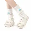 Calcetines holgados de dibujos animados estilo Lolita para otoño e invierno, calentadores de piernas de punto estilo JK universitario, calentadores de piernas lindos de huesos de subcultura para mujer