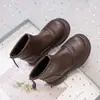 Botas Martin para niñas 2026 otoño e invierno estilo nuevo botas individuales versátiles de suela suave para niños negro algodón de dos capas simples antideslizantes botas pequeñas de cuero