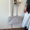 Otoño 2026 Nuevo Estilo Coreano Nicho Color Sólido Simple Ligero Bolso Tote Casual Gran Capacidad Bolso de Hombro Único para Viajar
