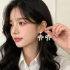 Pendientes de lazo de encaje estilo francés con perlas para mujer, moda de lujo ligero con un toque de alta gama y elegancia