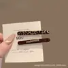 Lindo pasador de pelo de gatito negro, moderno y versátil para mujeres, perfecto para sujetar el flequillo y el cabello lateral, con un diseño de pinza de pico de pato de alta gama