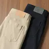 Pantalones casuales rectos ajustados versátiles de color otoño para hombre, suaves, elásticos, de sarga, estilo americano de cinco bolsillos, para negocios