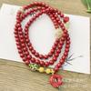 Suministro directo de fábrica pulsera de cinabrio de arena de Emperador natural forma original alto contenido arena roja pulsera de bambú al por mayor