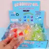 Bloques de construcción de frutas transfronterizos, juguetes de apretar de aceite de coco, rodajas de frutas transparentes incrustadas en el interior, juguetes para aliviar el estrés, colores surtidos de frutas, al por mayor