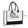 Bolsa de Lona para Boda Transfronteriza con Múltiples Personajes, Bolsa de Mano para Novia/Sra. con Moño en Contraste Blanco y Negro