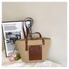 2025 Nova Exportação Bolsa Feminina Textura Tecida Estilo Coreano Tendência Simples Grande Capacidade Bolsa de Ombro/Axila Tecida