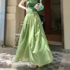 Toma Real de Falda de Algodón y Lino Transparente con Pliegues Diseño Verano 2026 Color Verde Fruta Festivo de Longitud Media con Corte Amplio en A