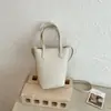 Bolso de mujer grande, moderno y sencillo, modelo nuevo 2026, bolso de hombro para el trabajo con un toque de alta gama, bolso de mano, bolso tote, bolso tipo cubo