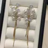 Pendientes de Borla de Perla de Lujo Luz Dorada 2026 Nuevo Estilo Popular Pendientes Elegantes de Gama Alta Diseño de Nicho Accesorios para Orejas