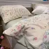 Nuevo juego de cuatro piezas de gasa de doble capa, funda de edredón amigable con la piel, juego de tres piezas para dormitorio de estudiante, funda de almohada y sábana para el hogar