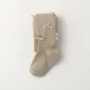 Suministro exclusivo transfronterizo de leggings para niños, pantimedias de Clase A para niñas, leggings para bebé con lazo para primavera y otoño, pantalones largos para niñas