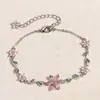 Bestseller transfronteiriço: pulseira fofa e doce em estilo pastoral com designs de coração e flor, perfeita como presente de Dia dos Namorados para usar em camadas