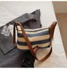 Bolsa Pequena Feminina Exquisita 2026 Nova Bolsa de Palha Colorida Tecida Estilo Tendência para Férias na Praia Bolsa de Ombro Transversal