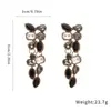 Aretes de Aguja de Plata con Borlas de Gota de Agua Incrustadas de Diamantes, Lujo Ligero y Sensación de Alta Gama, Artesanía Europea y Americana de Alta Resistencia, Diseño Exagerado, Estilo de Nicho
