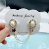 Clip de bufanda de cristal de moda coreana para mujer, hebilla de conexión de cuello ajustado para cárdigan, clip anti-exposición, venta al por mayor