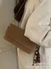 2025 Novo Design de Nicho Tendência Bolsa de Ombro Único de Alta Qualidade para Mulheres Outono e Inverno Versátil Baguete de Mão Transversal