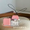 Botão de Mérito Descompressão Sem Luz Brinquedo Divertido Cor Macaron Russo Quadrado Corrente para Celular Chaveiro Atacado